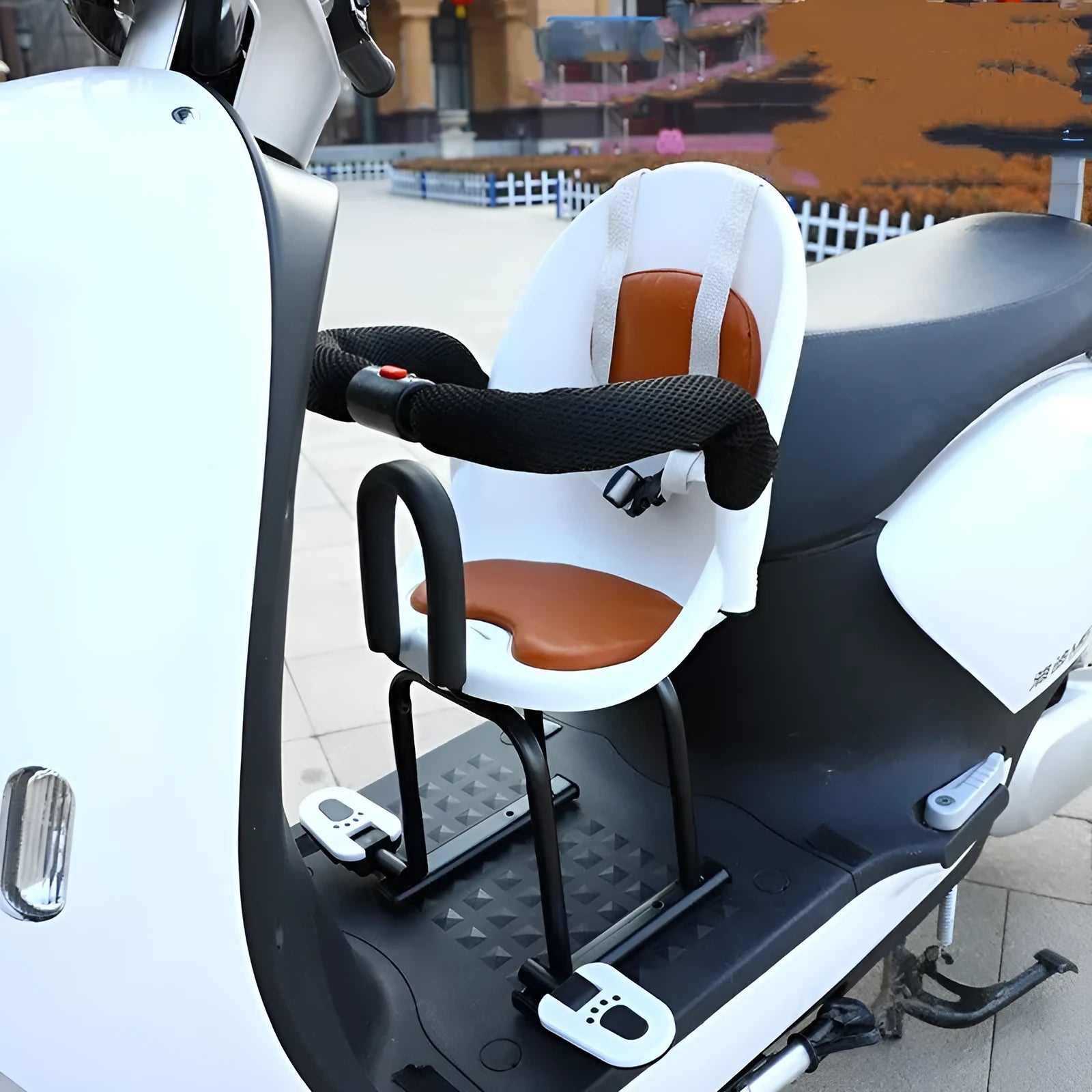 Front-mounted child safety seat for battery scooter in black, showing high carbon steel frame.
