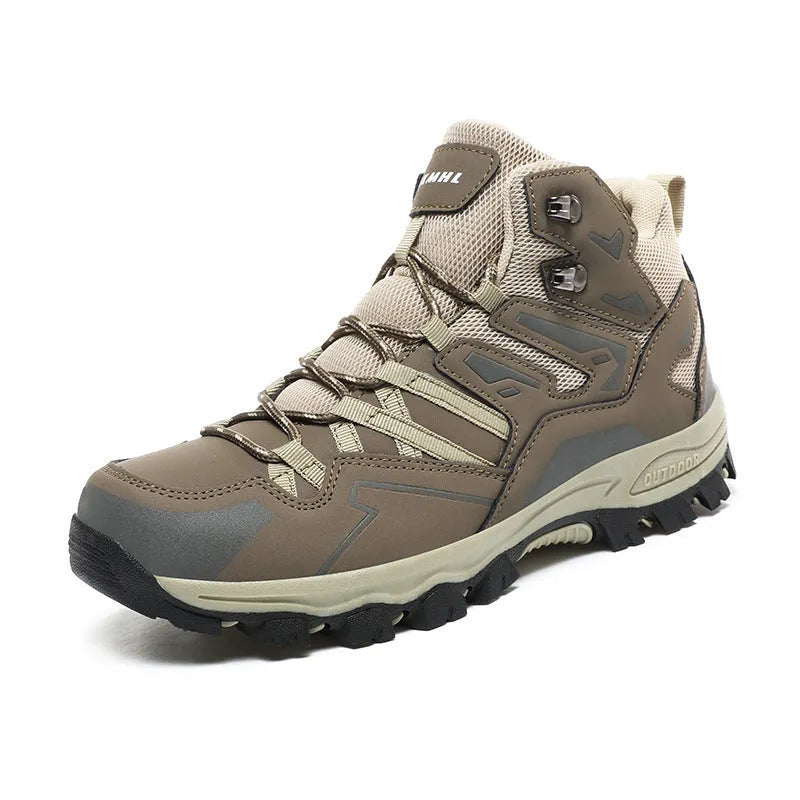 Flannel upper hiking sneakers with rubber soles in light brown colour on a rocky path.