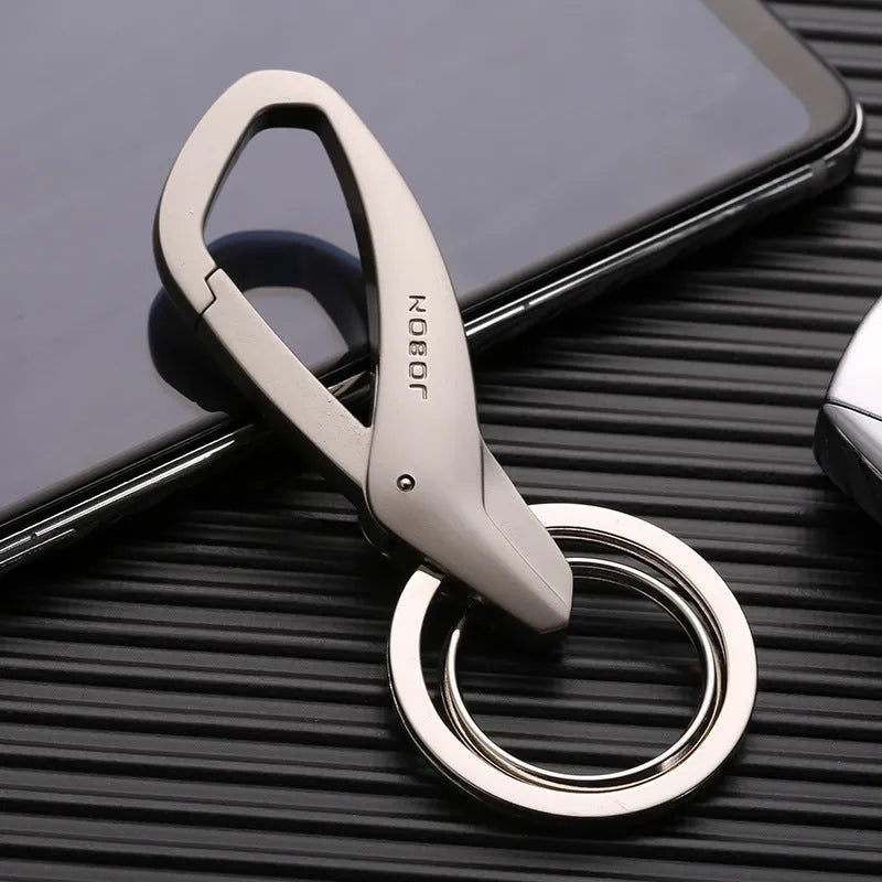 Zinc alloy double ring car keychain in black, chrome, or nickel colour.