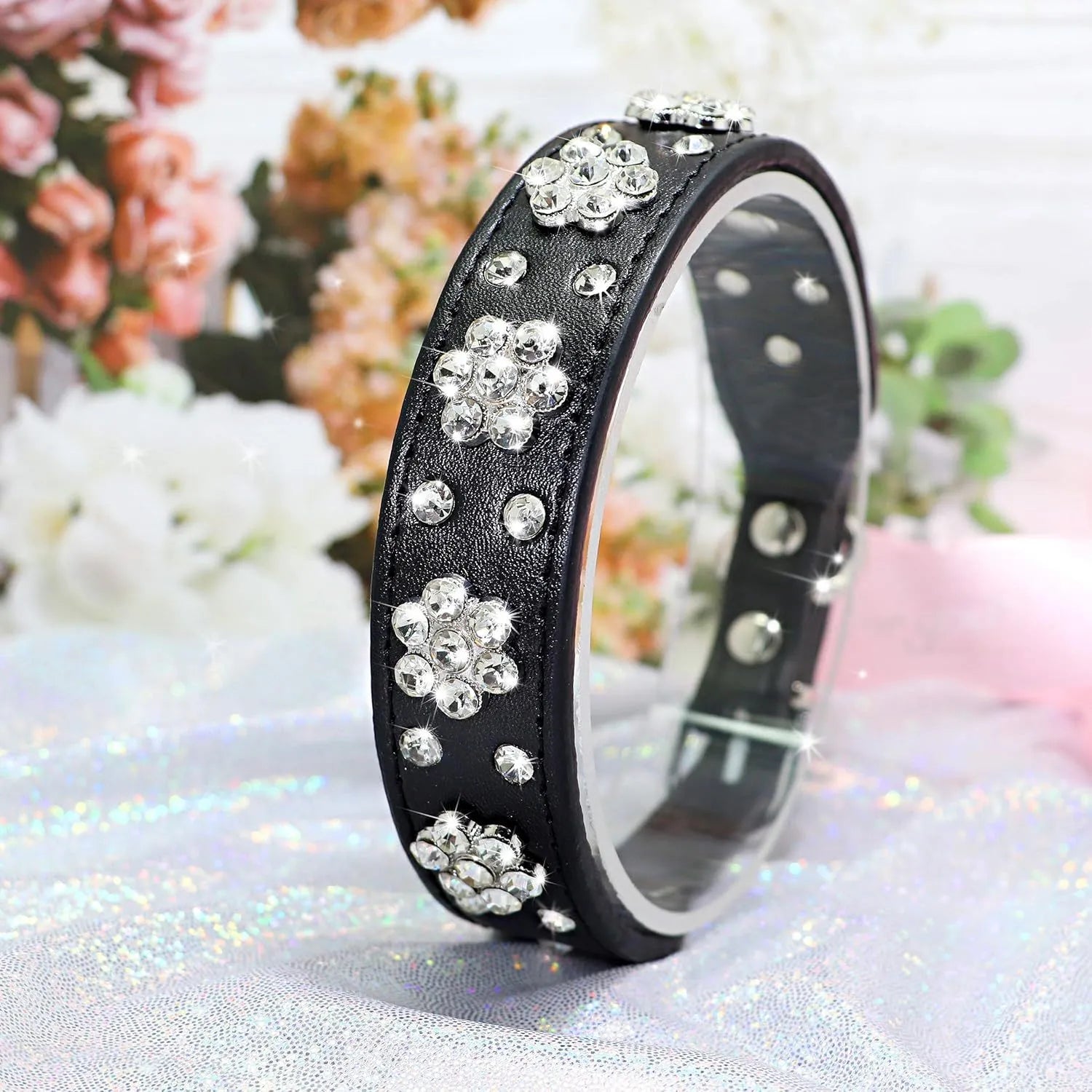 Soft black PU leather dog collar with a sparkling rhinestone flower pattern and metal studs