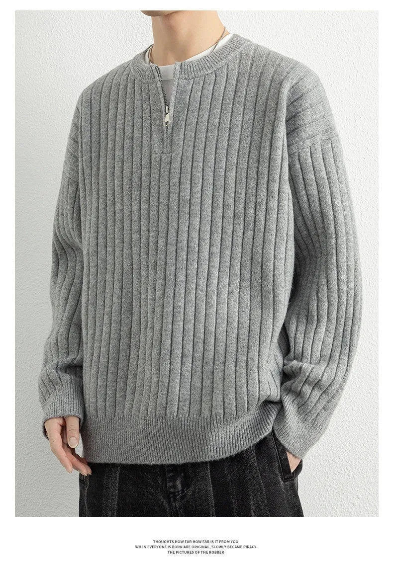 Men's grey textured knit half-zip pullover sweater with loose fit and long sleeves