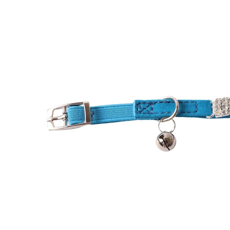Flocking material cat collar with elastic buckle and gang drill design in assorted colours.