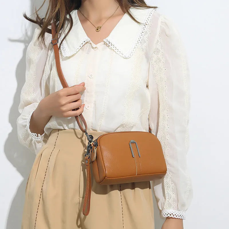 Genuine leather women's shoulder bag in horizontal square shape showing black colour option