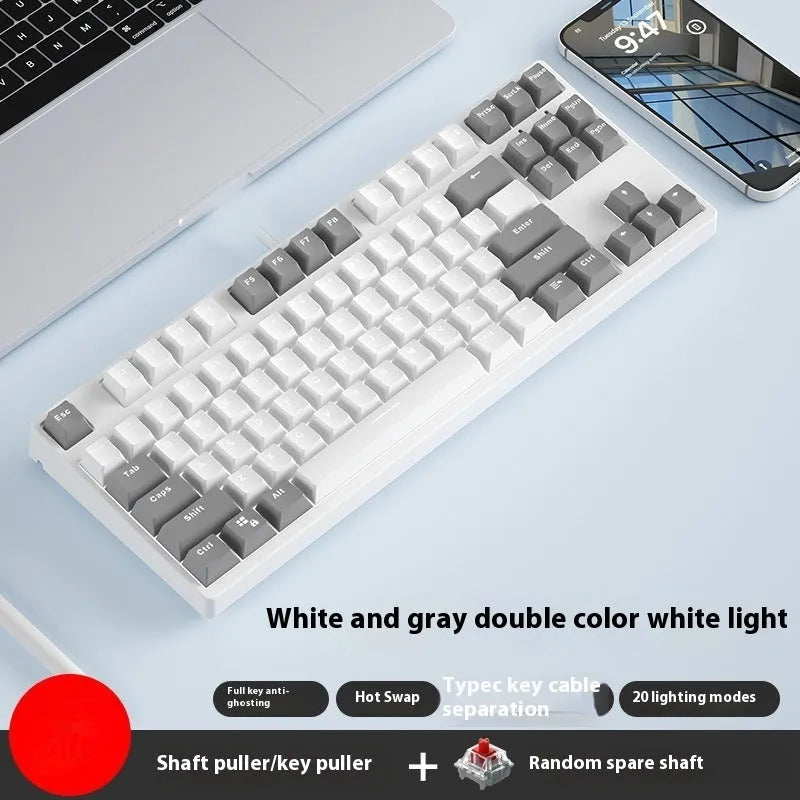 87-key wired mechanical gaming keyboard with colourful keycaps on a metal frame, shown with key puller and cable.