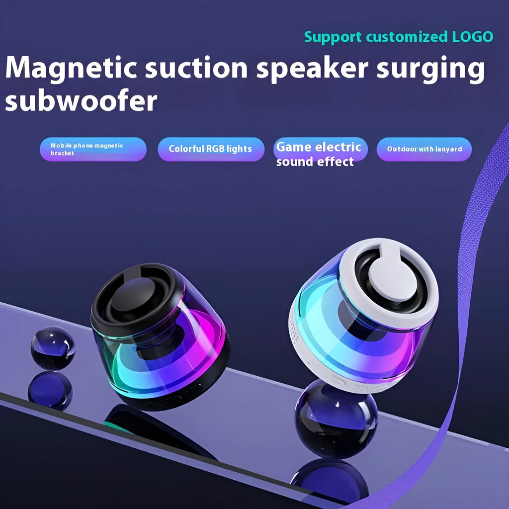 Black and white portable Bluetooth speaker with ambient lighting and magnetic base
