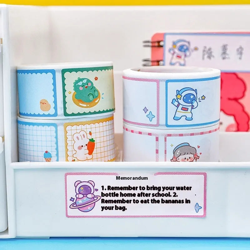 Roll of creative cartoon tape stickers showing dinosaur, astronaut, rabbit, and girl designs.