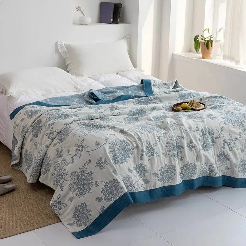 Pure cotton five-layer gauze bed sheet blanket in roulette wheel blue pattern showing modern simple style
