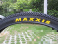 Mountain bike ultralight puncture proof tyre showing tread pattern, available in multiple wheel sizes.