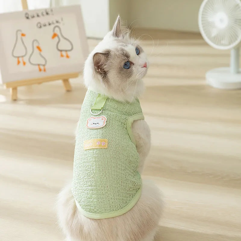 Knitted cat clothing with hollowed-out breathable design and cartoon bear patch in green colour