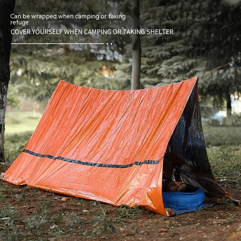 Disaster relief emergency tent with matching raincoat and sleeping bag in orange or green colours