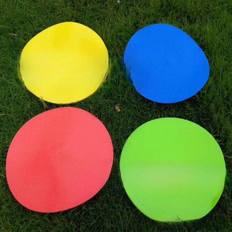 Soft TPE football training target pad measuring 23cm in diameter, available in six bright colours