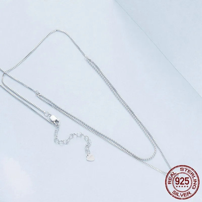 S925 sterling silver double-layer necklace with pearl chain and pendant for women.