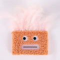 Big mouth explosion head shaped catnip plush toy in blue, green, orange, and purple colours