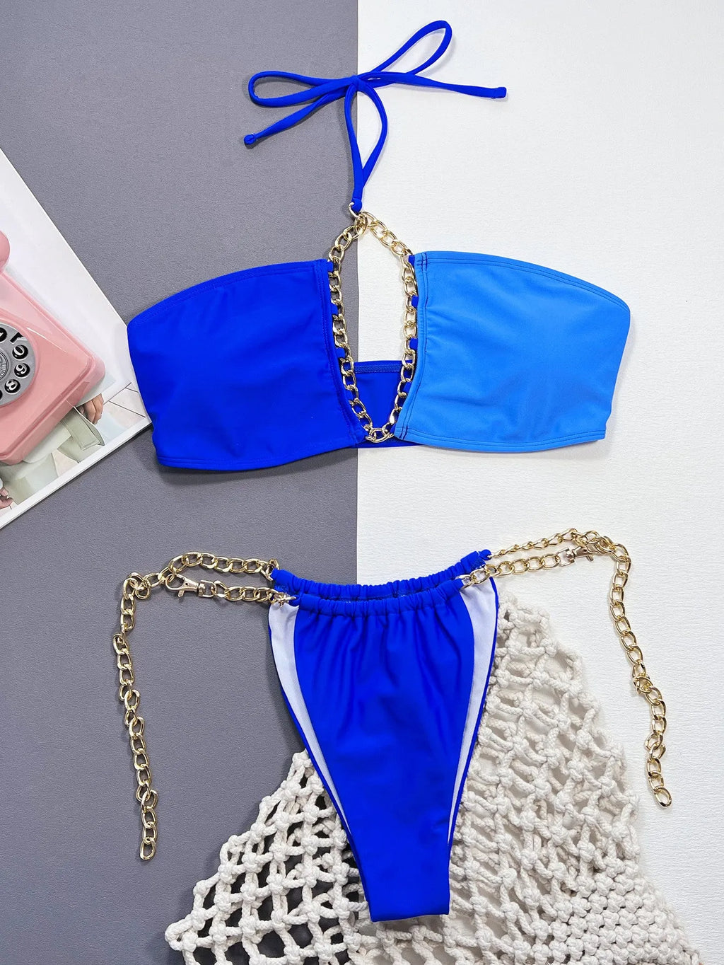 Women's blue nylon split bikini set top and bottom on display