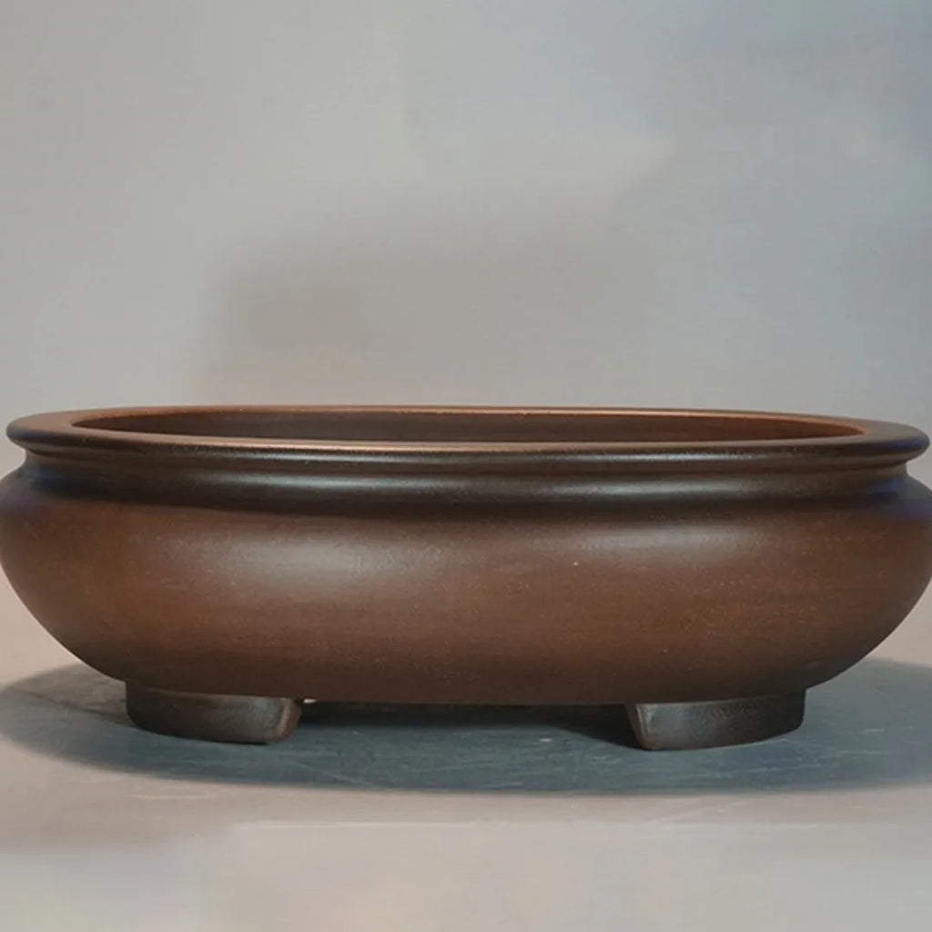 Purple clay handmade flowerpot measuring 58x47x18cm for indoor desktop plants