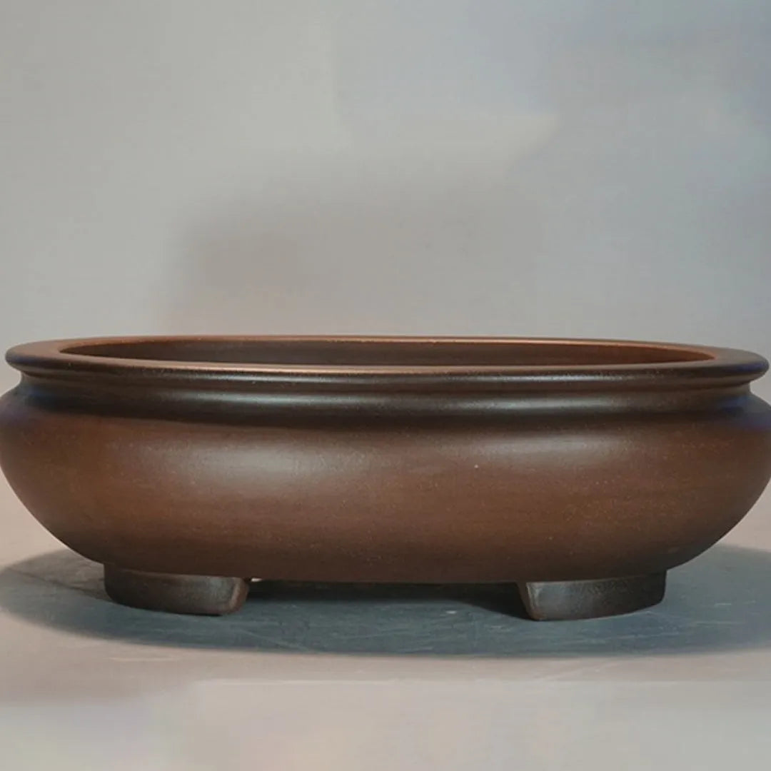 Purple clay handmade flowerpot measuring 58x47x18cm for indoor desktop plants