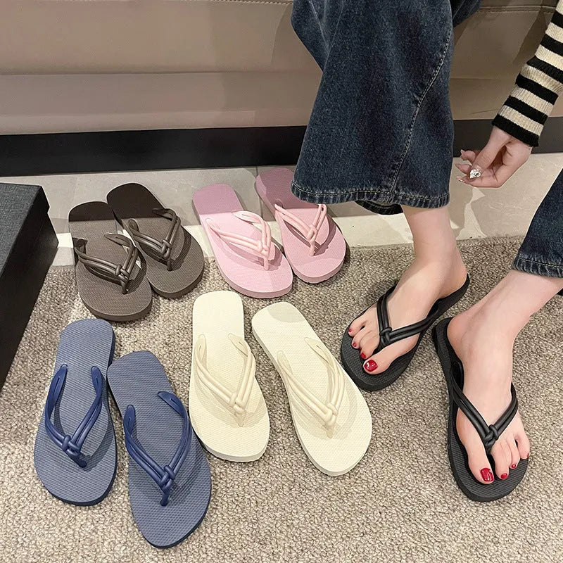 PVC casual flip flops in a toe-covering style on a plain background, showing the one-piece moulded construction.