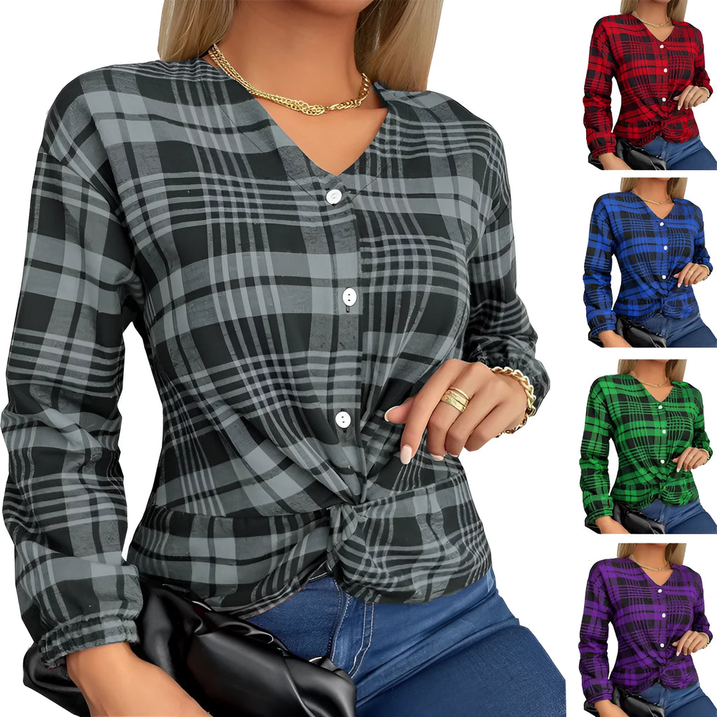 Woman wearing a loose-fitting purple plaid shirt with regular sleeves.