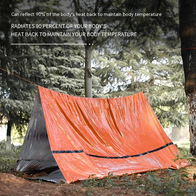 Disaster relief emergency tent with matching raincoat and sleeping bag in orange or green colours