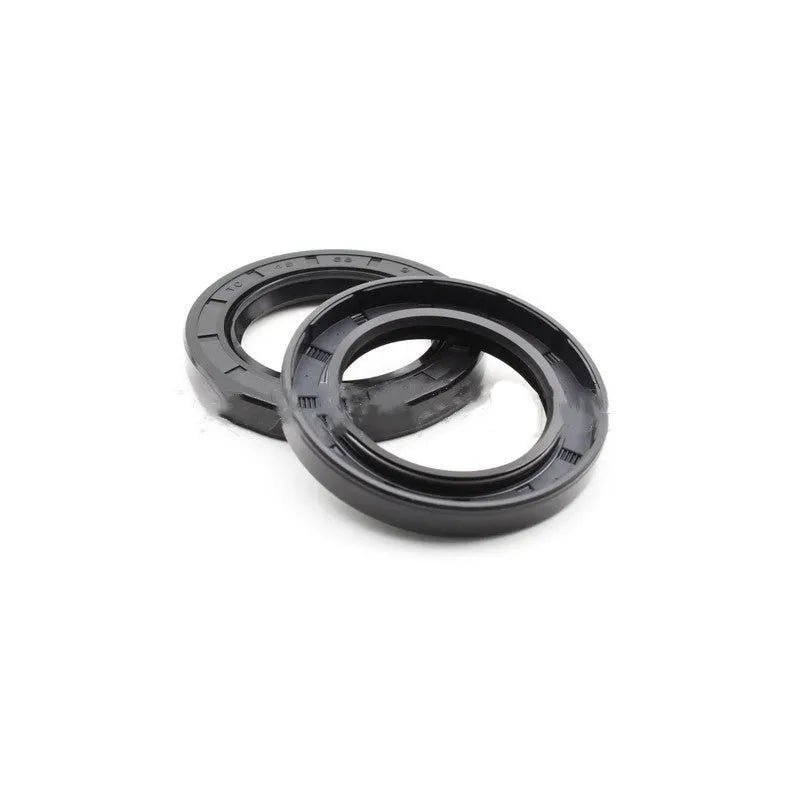 Ten black rubber and metal oil seals for AG100 motorcycle engines arranged on a white background.