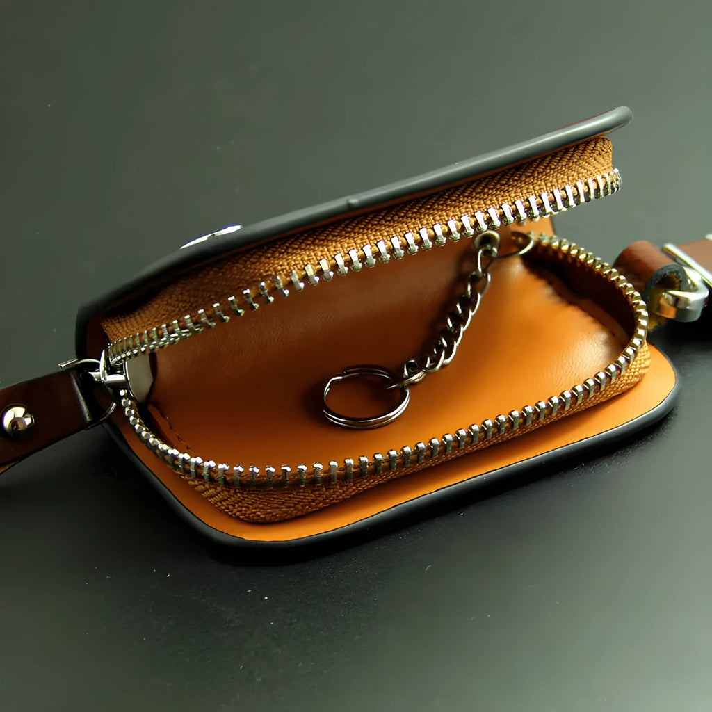 Genuine leather car key case with zipper in black and brown.