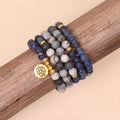 Multi-layer alloy women's bracelet with blue patterned network stone beads.