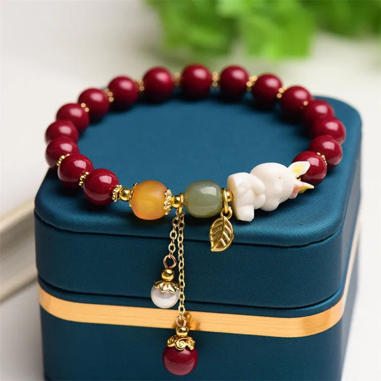 Tian Yu natural cinnabar bracelet with bunny rabbit design, 8mm or 10mm beads for women