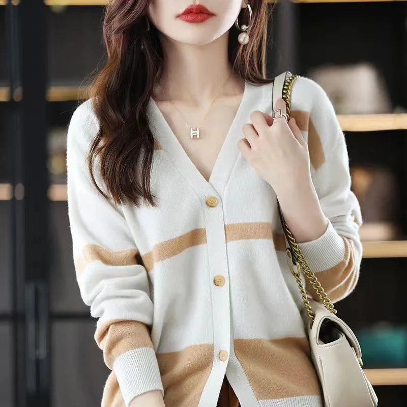 Women's striped V-neck knitted cardigan in a slim fit, showing 3D pattern detail.