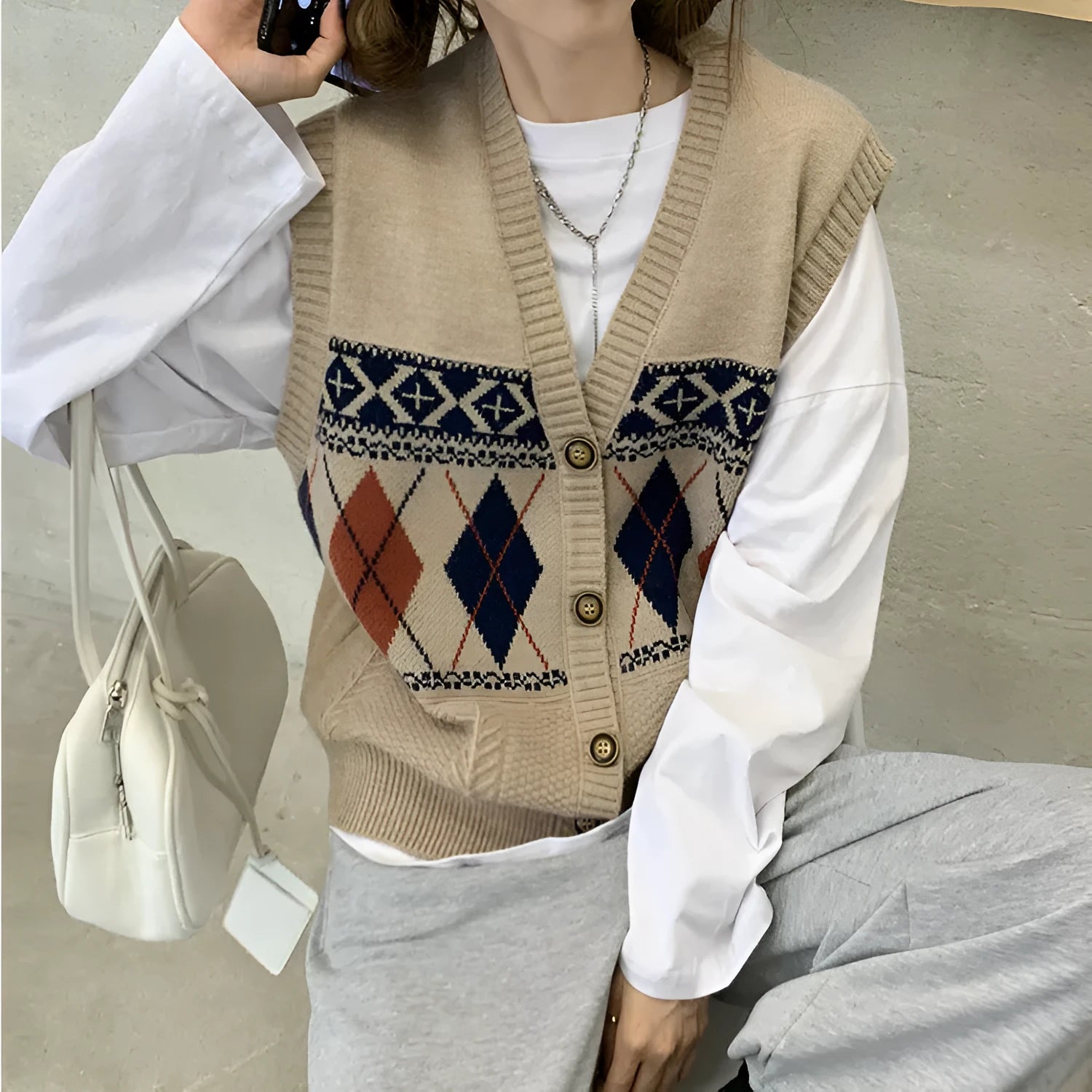 Diamond plaid sleeveless cardigan top in khaki colour, loose fit