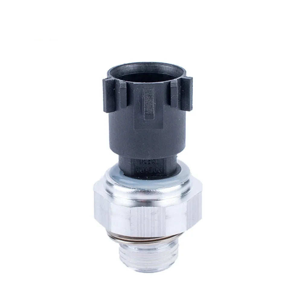 Silver-coloured automobile fuel pressure sensor with cylindrical design and electrical connectors