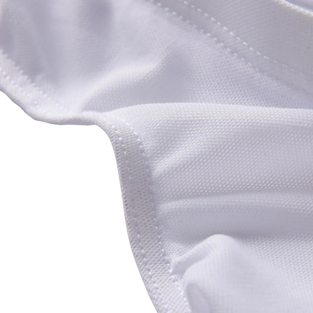 Men's black quick-drying nylon low waist briefs shorts on a plain background.