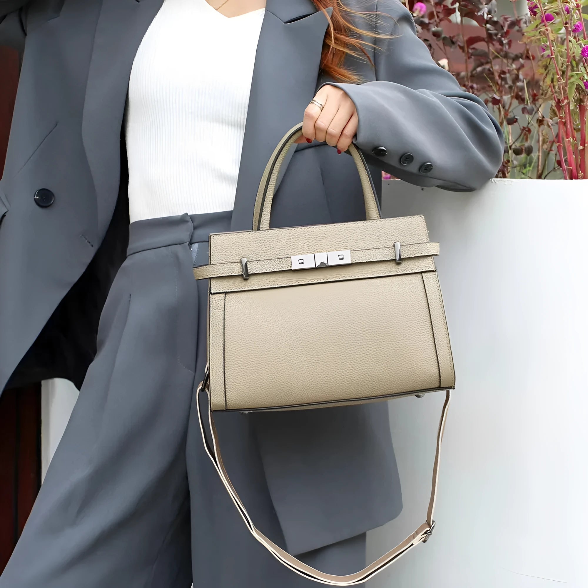 Genuine leather horizontal square shoulder bag with internal pockets in almond green colour.