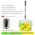 Stainless steel tennis ball picker roller on a court next to tennis balls.