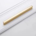 Gold aluminium alloy single-hole cabinet handle with T-shape design.