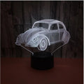 3D acrylic LED table lamp with colourful lighting on black base, showing touch controls and USB cable