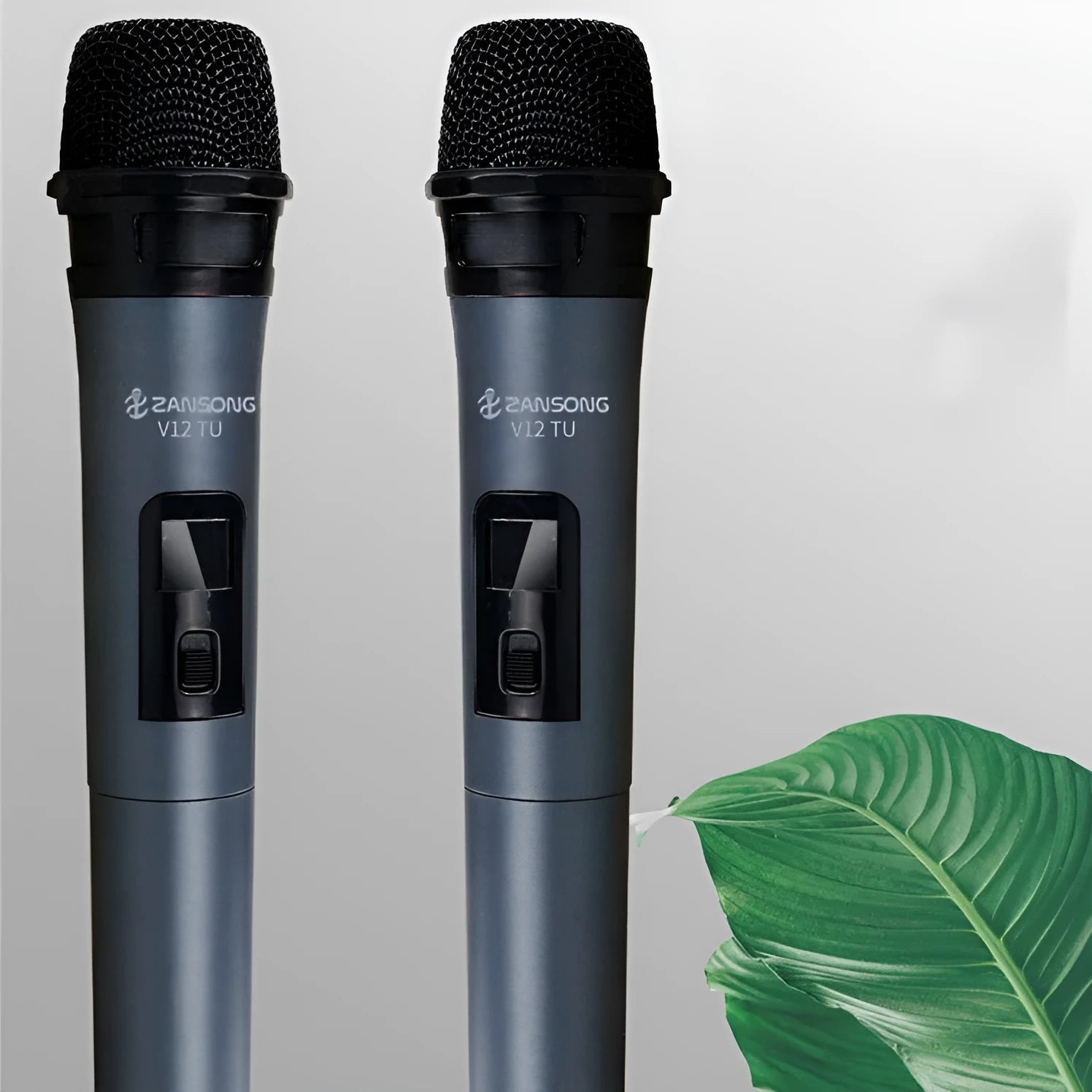 Black ZANSONG V12 dynamic wireless handheld microphone with USB receiver and audio cable.