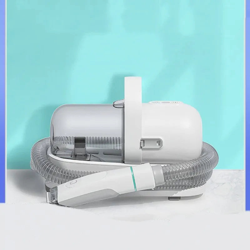 Pet grooming device on white background, ABS body, 290mm length, with trimming shears and massage comb accessories
