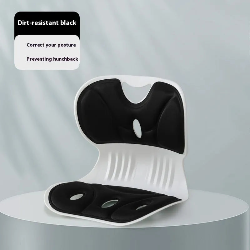 Memory foam lumbar cushion in grey with elastic fixing band on a chair