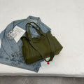 Women's polyester canvas shoulder tote bag in solid colour with exterior sandwich pocket