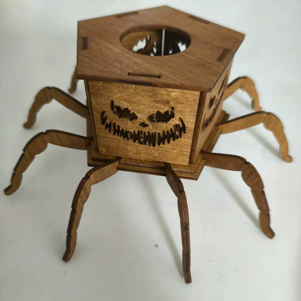 Wooden Halloween ornament with ghost and spider design on a lantern candlestick, 21cm tall.