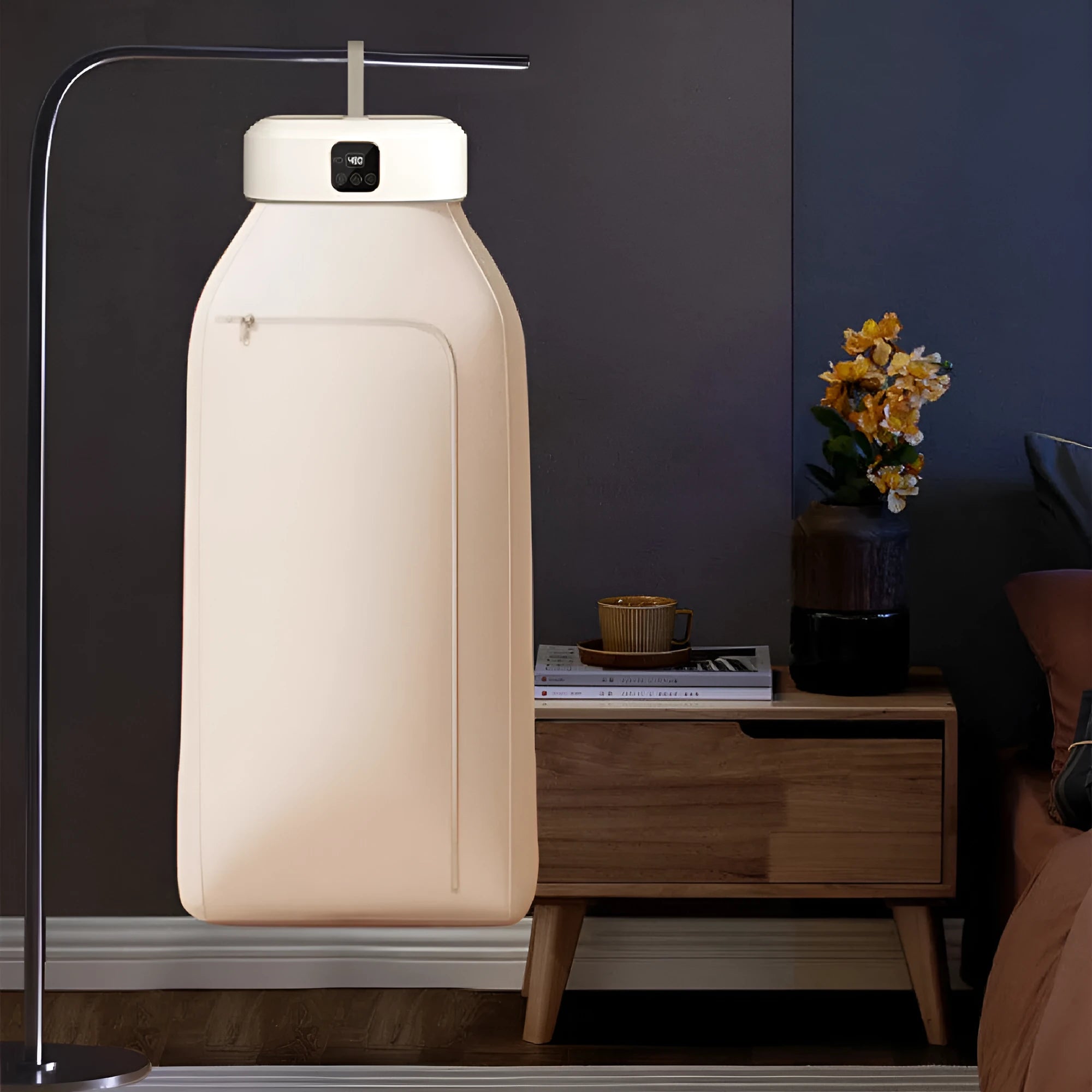 White cylindrical remote control laundry dryer with foldable design for compact storage