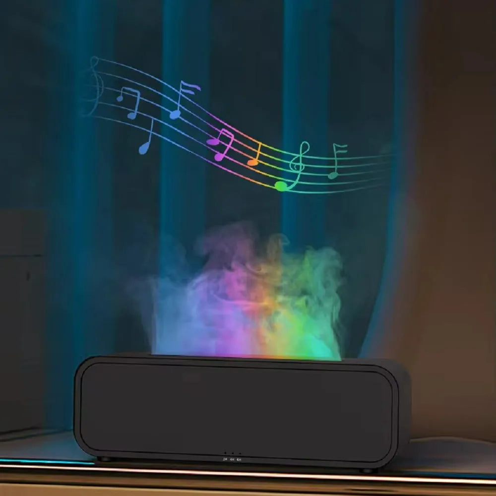Black and white aroma diffuser with flame effect and colour-changing lights showing remote control