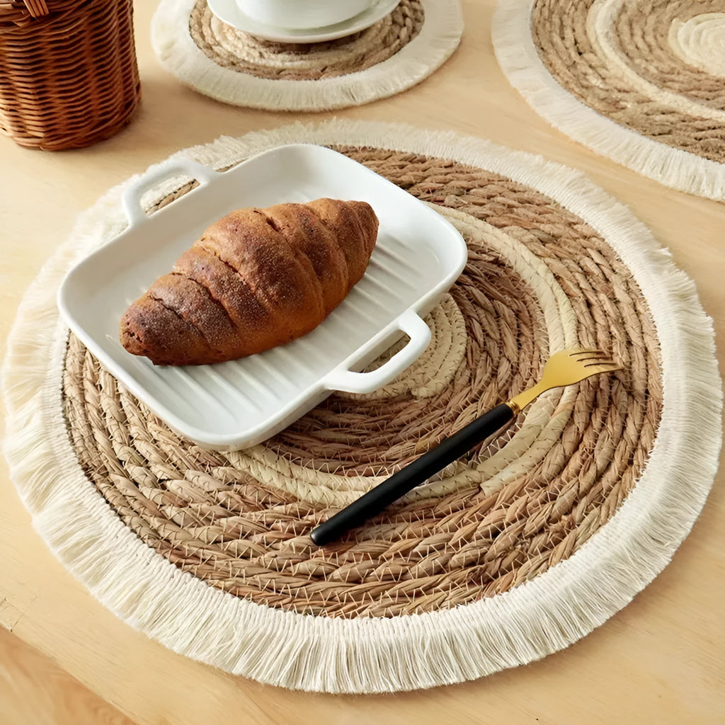 Round Japanese straw placemat with corn rope tassel edge in natural papyrus material
