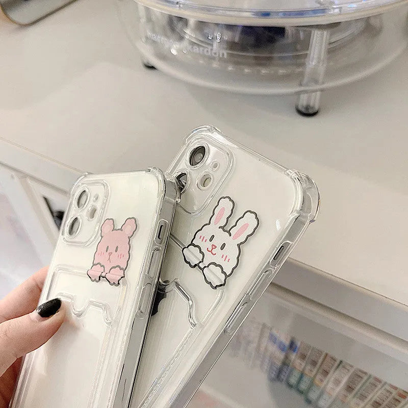 Cartoon design transparent TPU iPhone case with integrated card holder slot.
