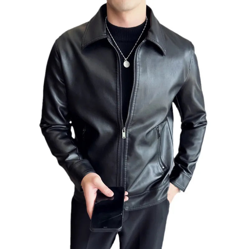 Black men's loose fit PU leather jacket with zipper pockets on a model.