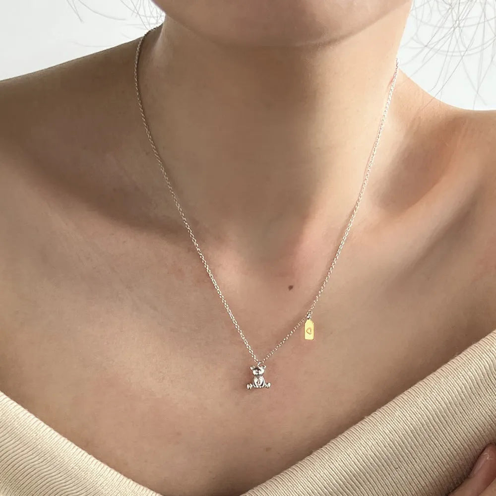 925 silver bear necklace for women with electroplated finish on white background