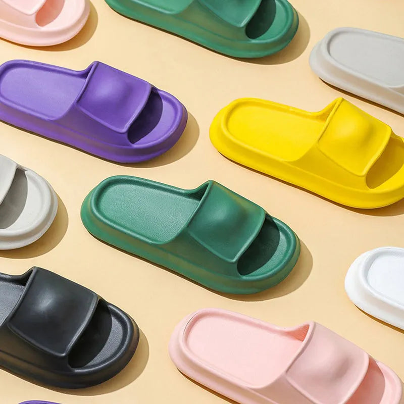 Soft EVA bathroom flip-flops with thick non-slip sole in multiple colour choices on a white background.