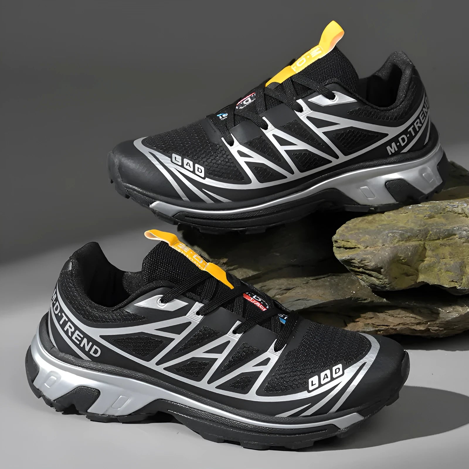 Low-top outdoor hiking shoes in multiple colours with lace-up front and rubber soles