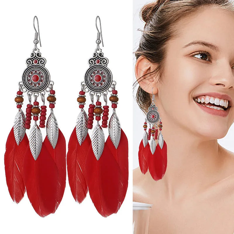Round drop feather earrings in alloy with leaf shape and Bohemian patterning