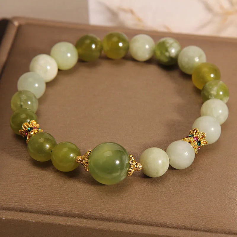 Women's jade green bracelet made from Xiuyan jade stone with adjustable cord